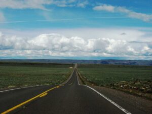 A road runs into the far distance